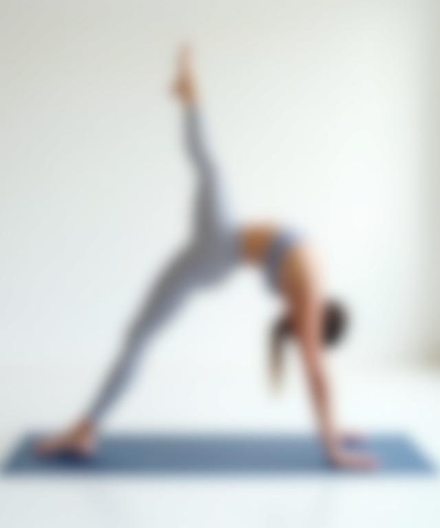 Beginner practicing a peaceful yoga stretch in a sunlit studio
